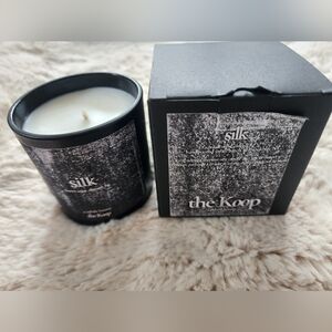 Scented candle net wt. 12 ounces.  SILK BROWN SUGAR, ALMOND, FIG